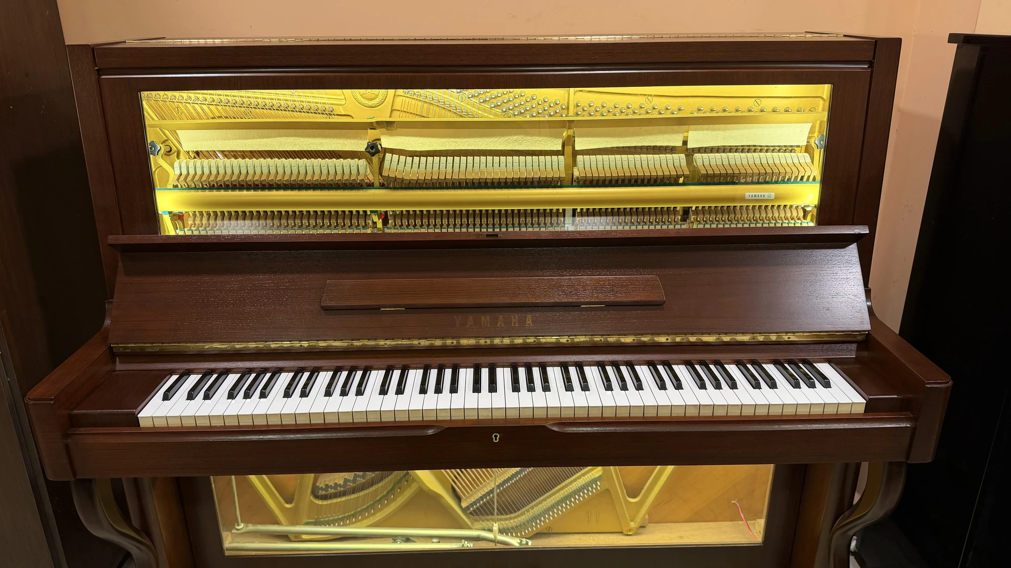 Inside an upright piano: hammers, strings and keys, Basbous & Sons atelier