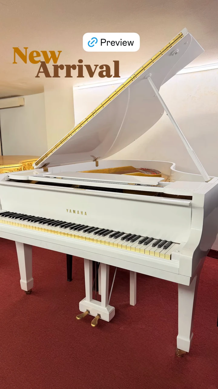 New arrival: a white Yamaha grand piano in the Basbous & Sons showroom