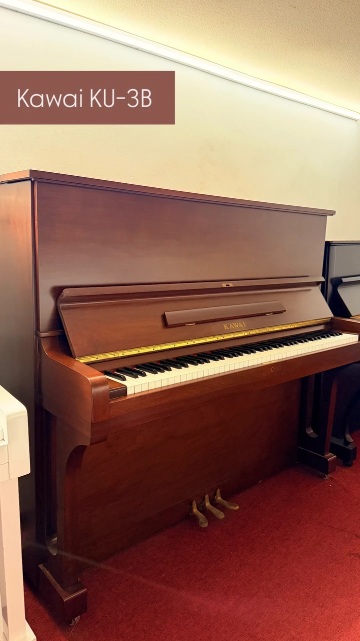 A Kawai KU-3B upright in walnut